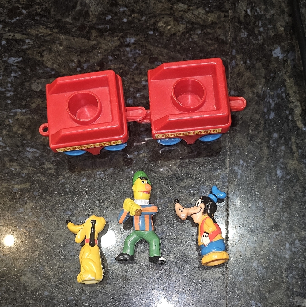3/20.00. Lot of 7 vintage Disney toys
